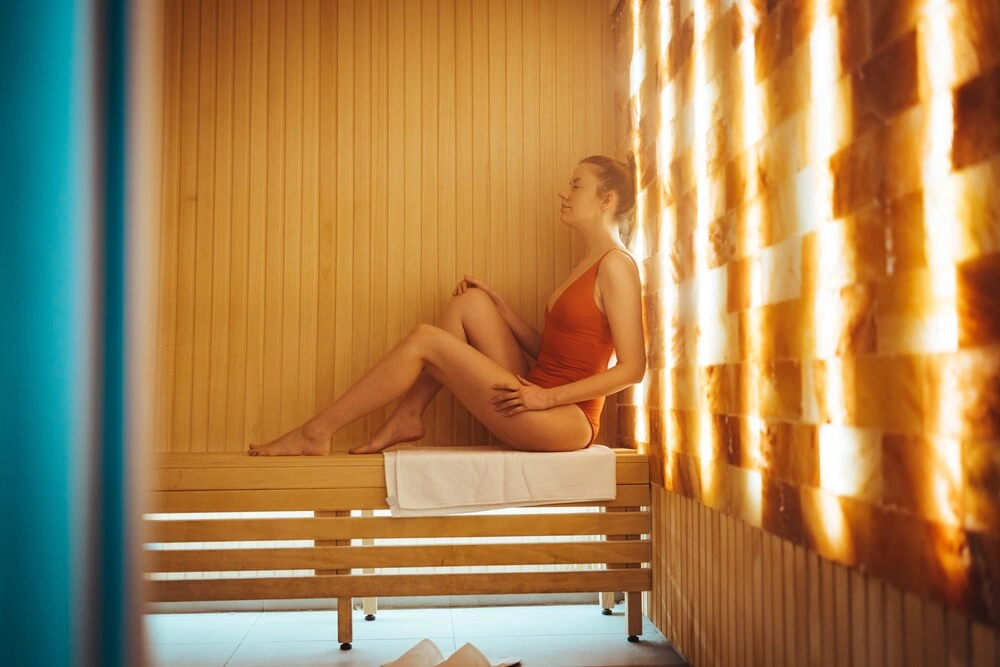 One woman relaxing in salt room and enjoying in halotherapy treatment.