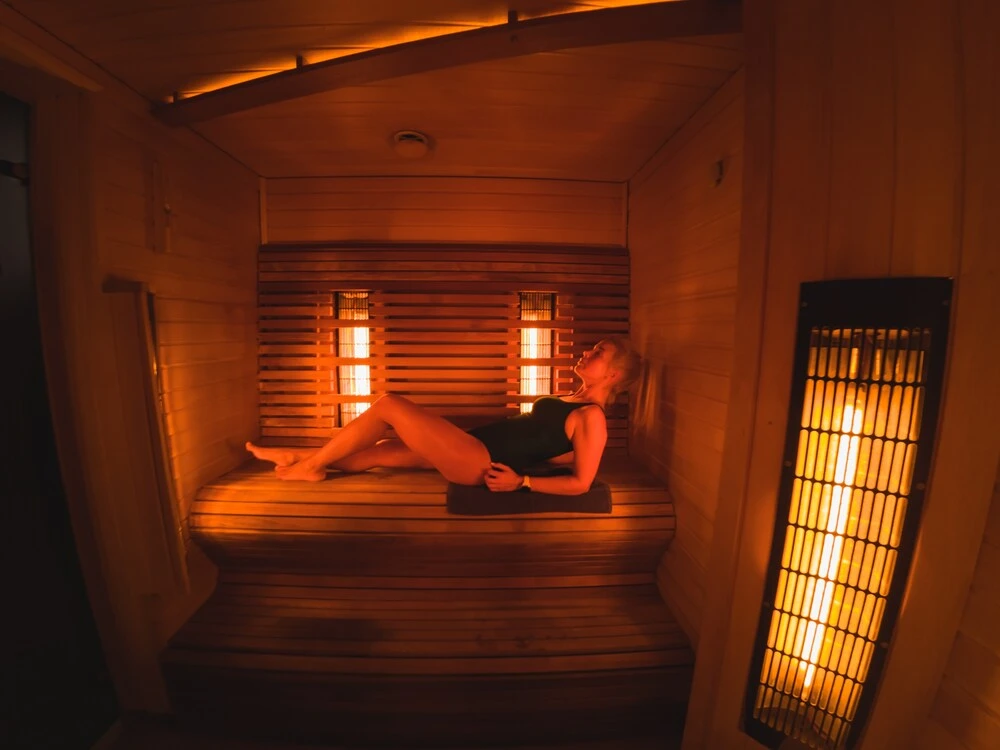 A girl lies in an infrared bath in the Rakvere spa center.